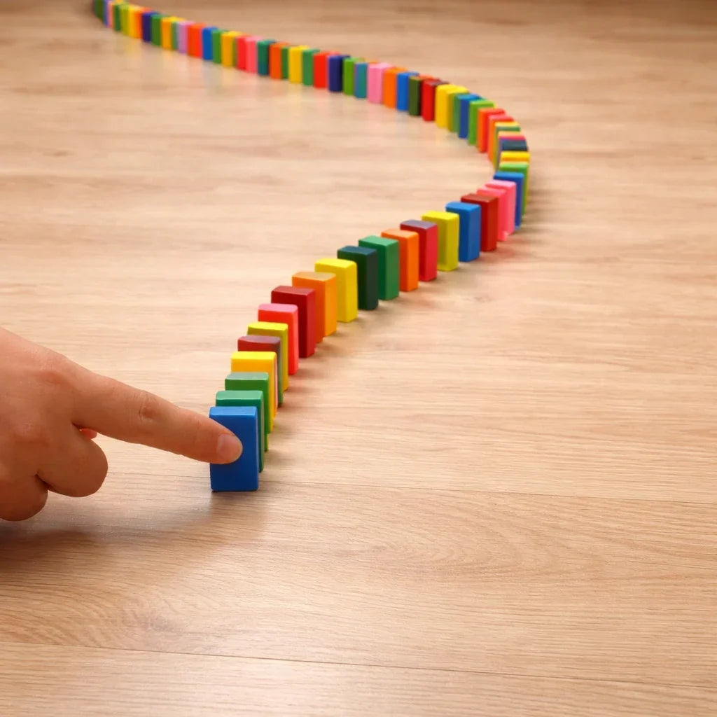 Domino Train Toy Set for Kids that Lays Dominoes Automatically for Cause and Effect Play, 2 Color Options