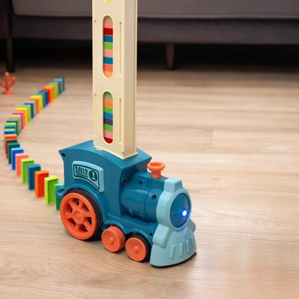Domino Train Toy Set for Kids that Lays Dominoes Automatically for Cause and Effect Play, 2 Color Options